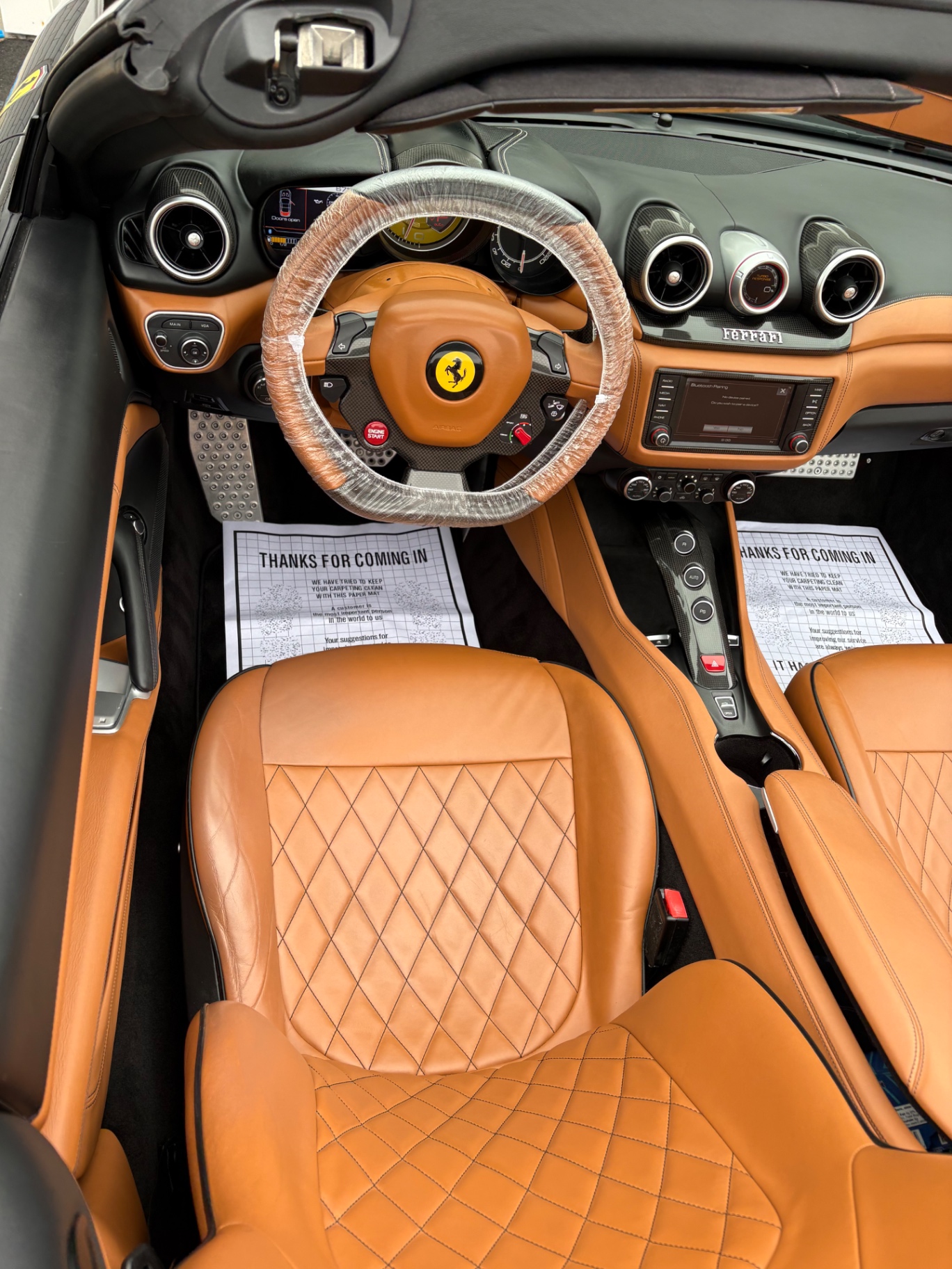 Detailed tan leather Ferrari interior