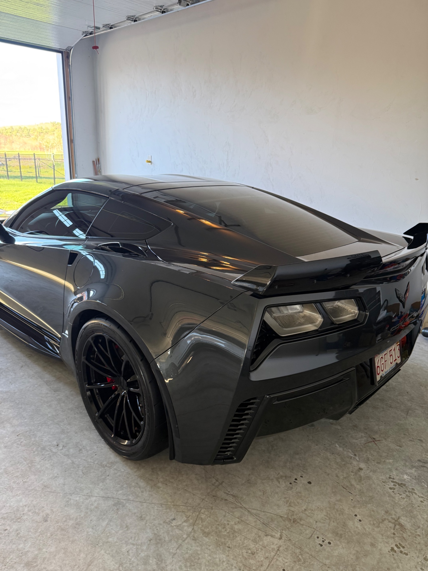 Glossy black Chevrolet Corvette after detailing