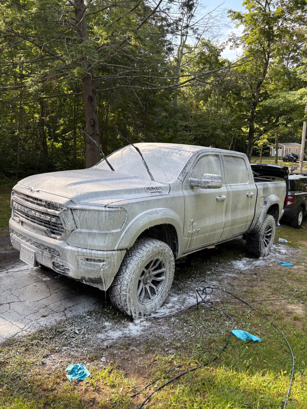 Ram pickup truck covered in cleaning foam