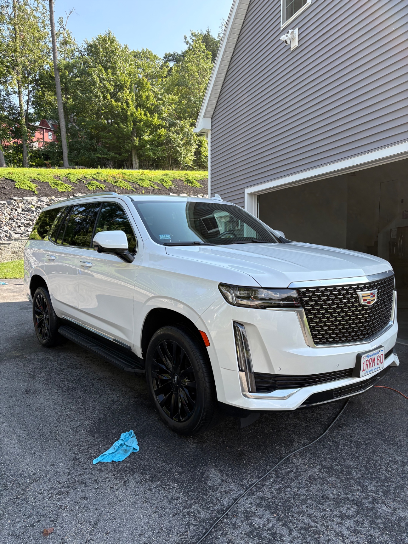 White Cadillac Escalade after an exterior detail