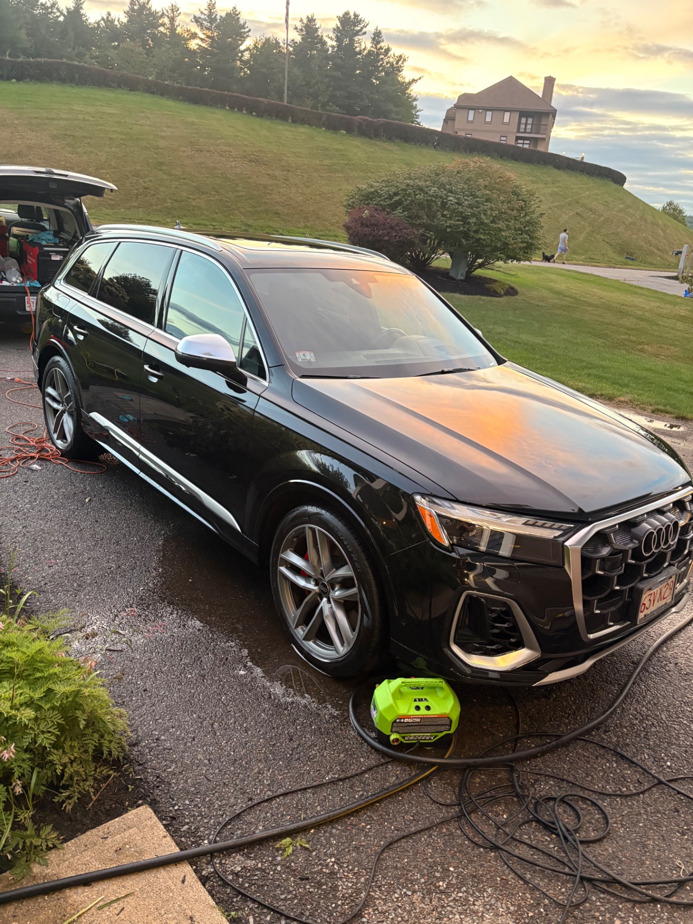 Glossy black Audi SUV after detailing