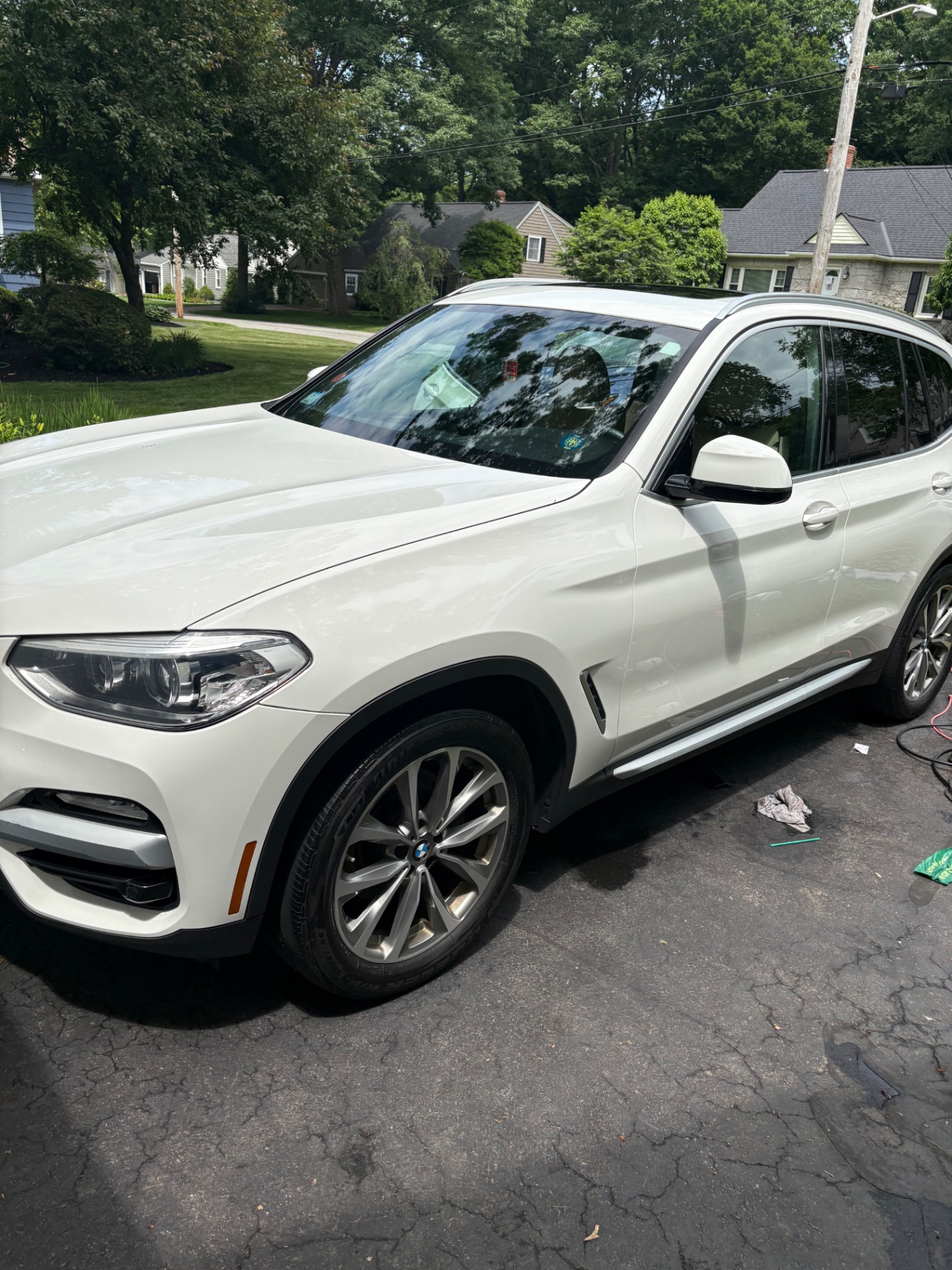 White BMW SUV after detailing